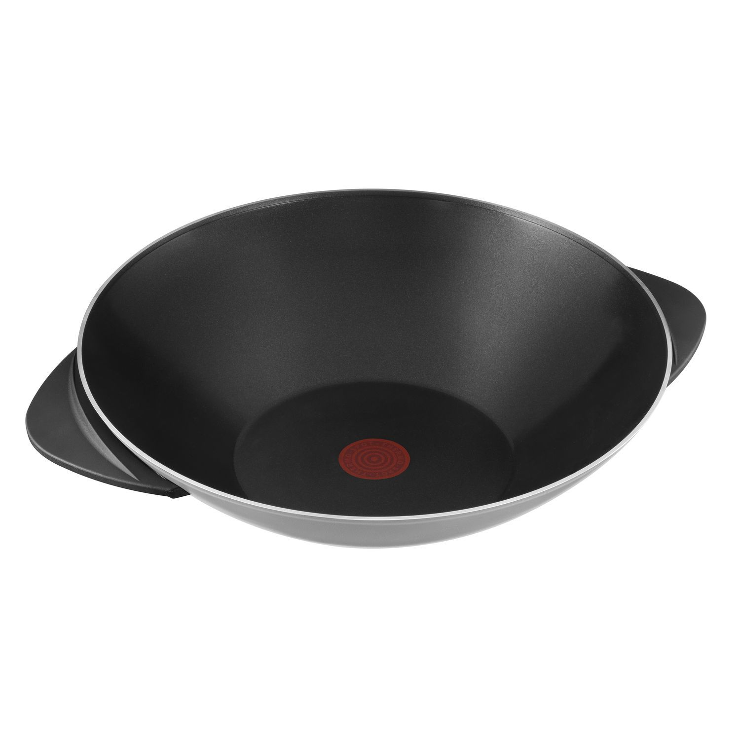A black wok with handles and a red circle in the center, on a white surface.