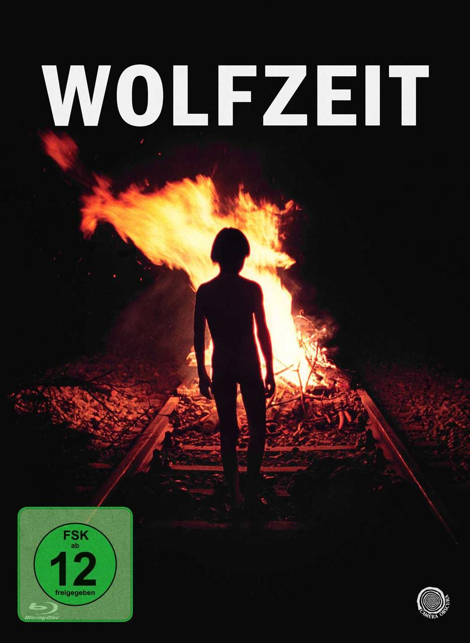 Filmplakat: Figur steht auf Bahngleisen. Titel 'Wolfzeit'.