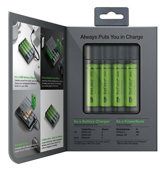 Ładowarka do baterii z 4 zielonymi bateriami AA. Opakowanie mówi 'Always Puts You in Charge'.