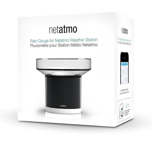 Deszczomierz Netatmo w pudełku. Białe pudełko ze zdjęciem produktu i smartfonem z danymi.
