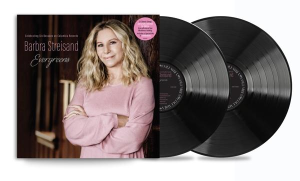 Barbra Streisand album borítója bakelit lemezekkel. Rózsaszín felső, sötét fa háttér.