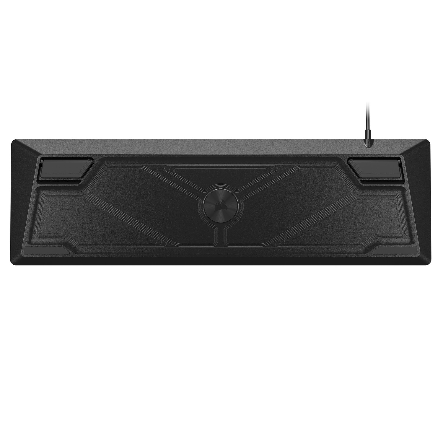 Black keyboard with two raised sections on the top and a central circle, on a white background.