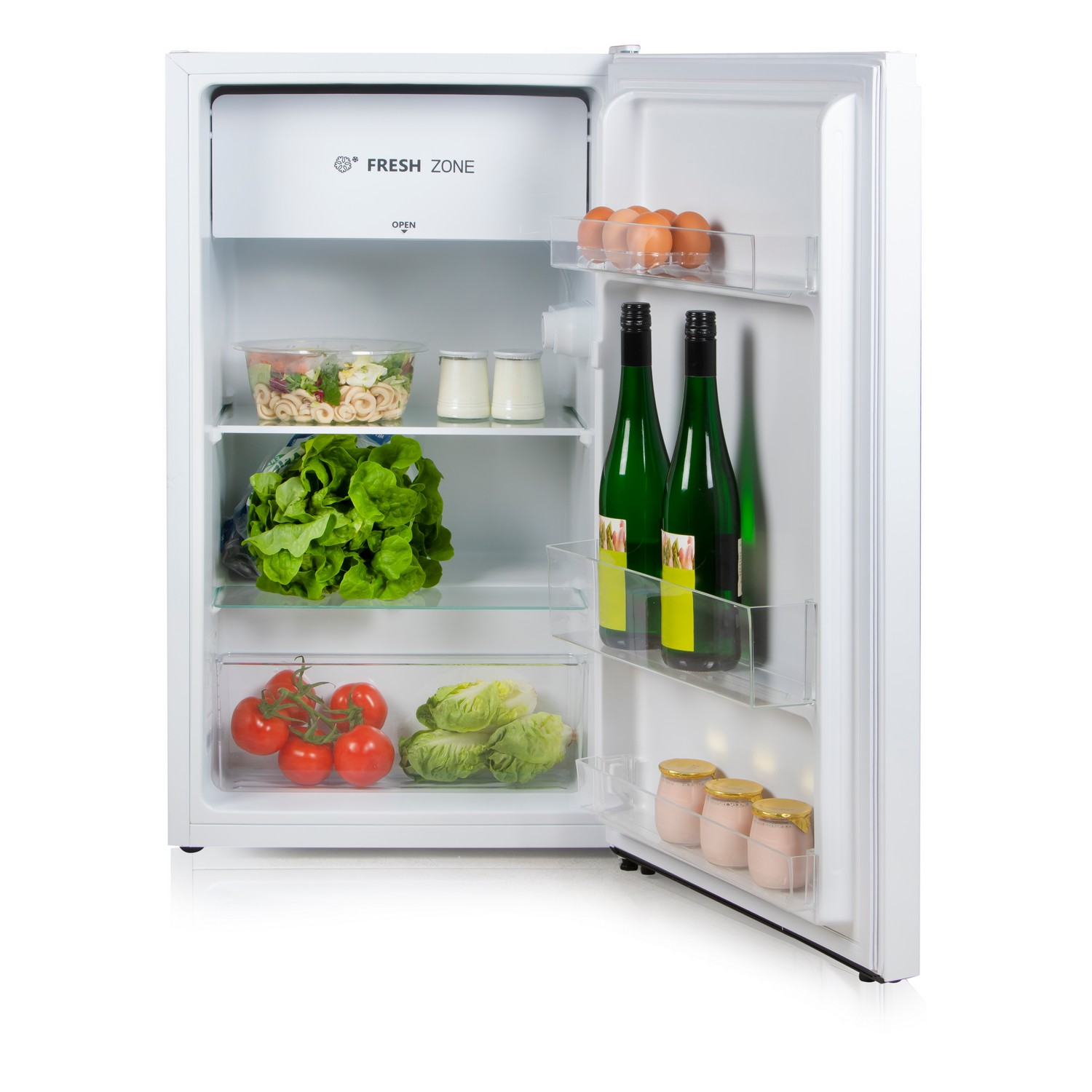 A white mini-fridge with the door open, showing food items like vegetables, eggs, and bottles of wine.