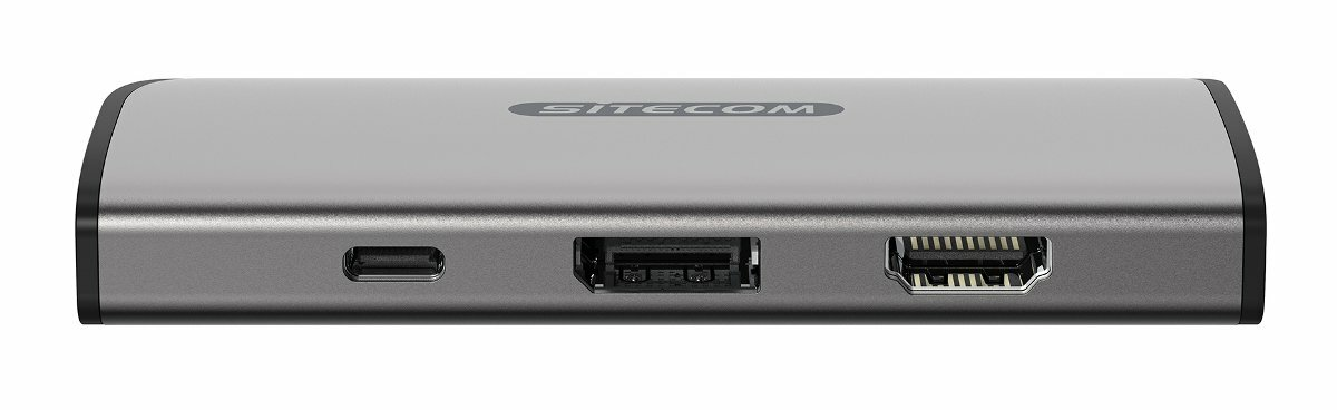 Srebrny hub SITECOM z portami USB-C, HDMI i innymi. Ma czarną obwódkę i jest na białym tle.
