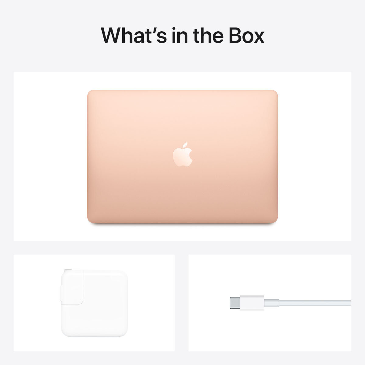 Laptop, ładowarka i kabel na białym tle.