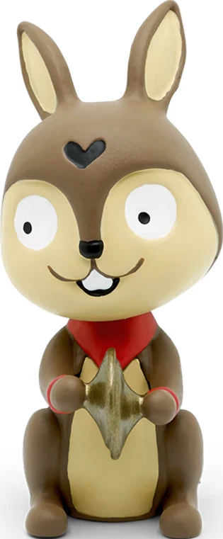 Une figurine de lapin de dessin animé. Il a un cœur sur la tête et tient une étoile.