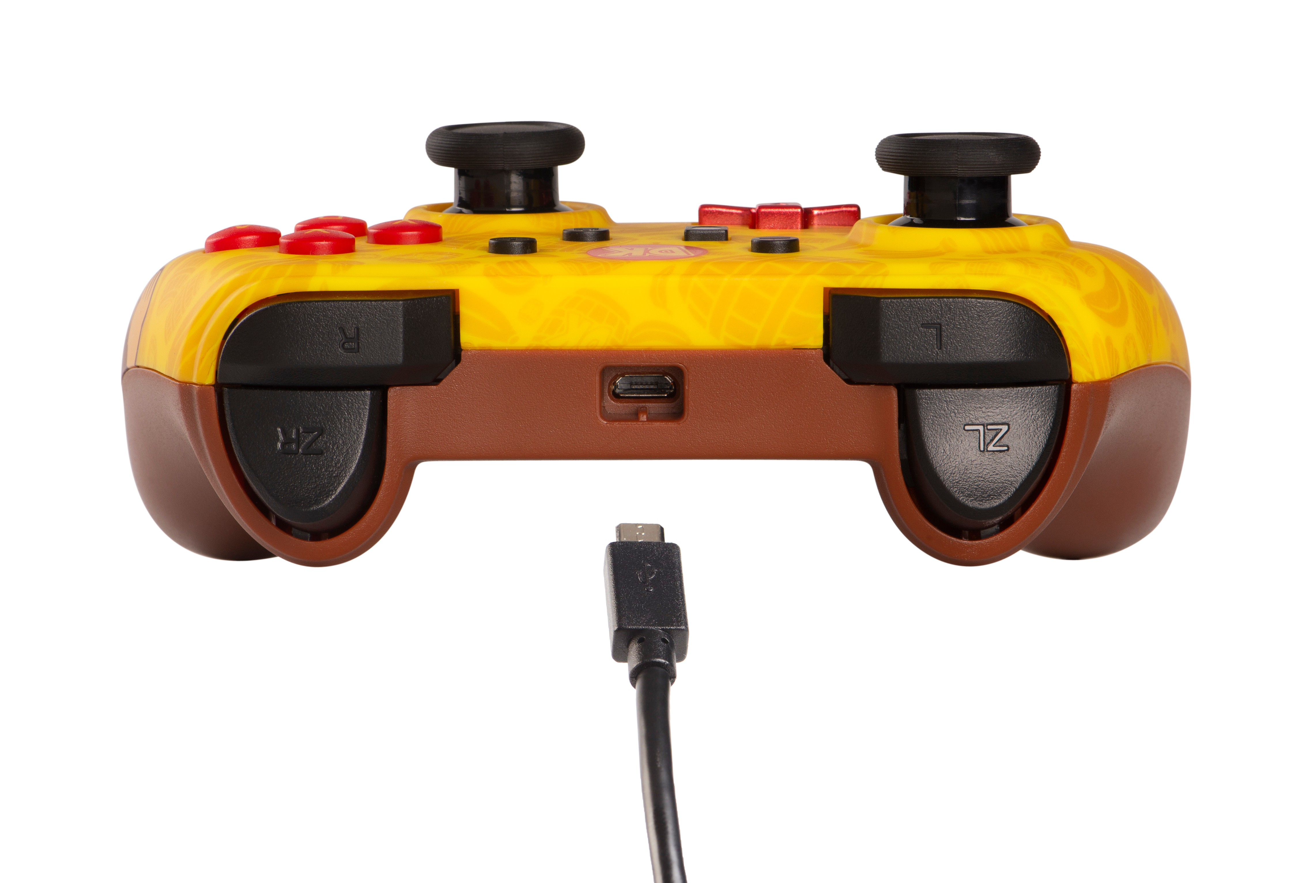 Gelb-brauner Gamecontroller mit Knöpfen und zwei Joysticks.