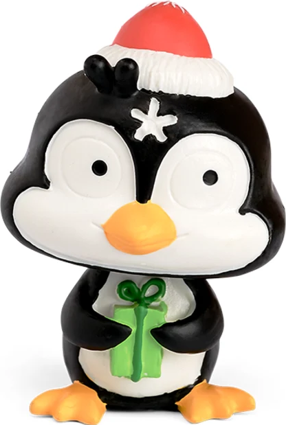 Figurine de pingouin avec un chapeau de Père Noël et un cadeau.