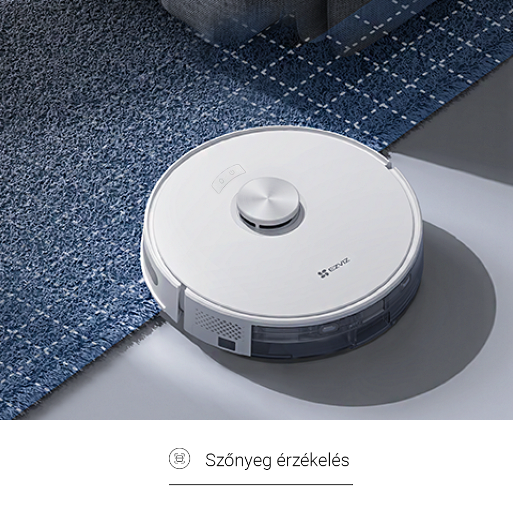 Robot porszívó kék szőnyegen.