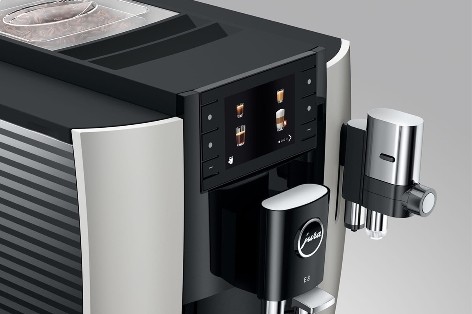 Primer plano de una máquina de café con pantalla táctil y botones.
