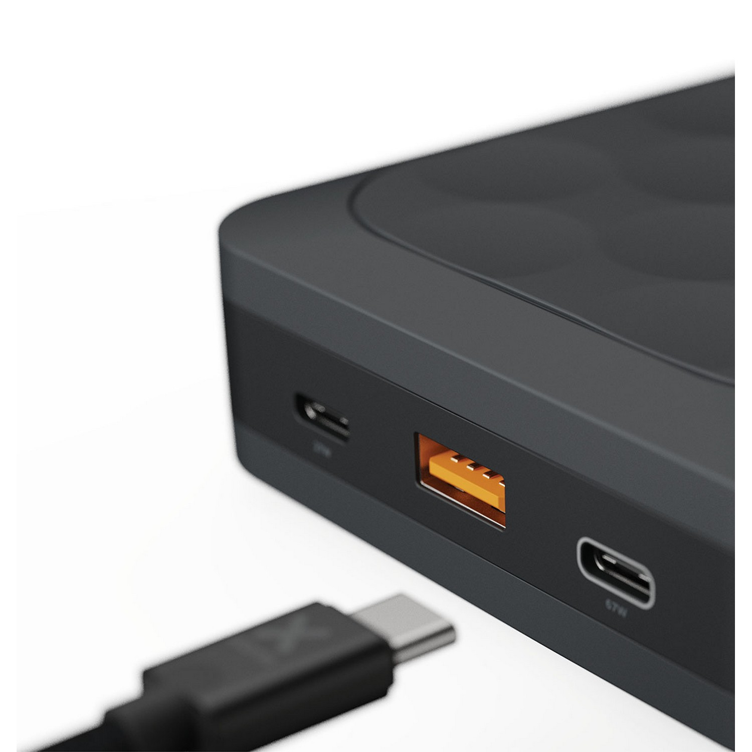 A black power bank with an orange USB port and a black USB-C cable.