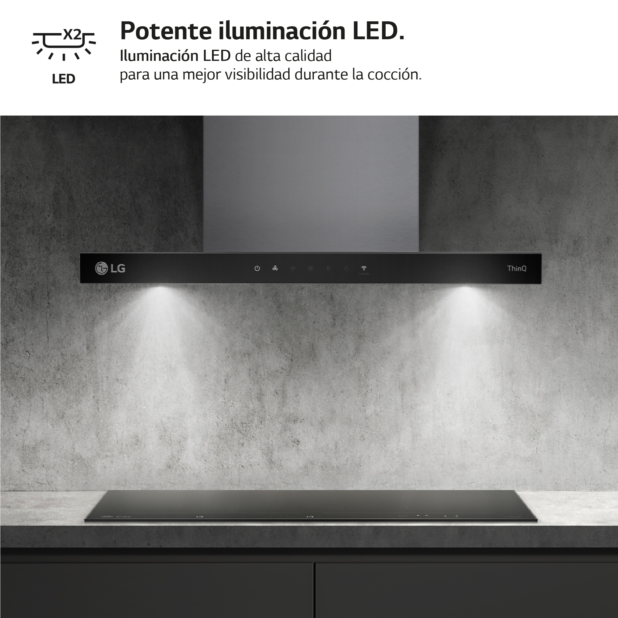 Una campana extractora LG sobre una placa de cocina negra, con luces LED brillantes que iluminan la superficie inferior.