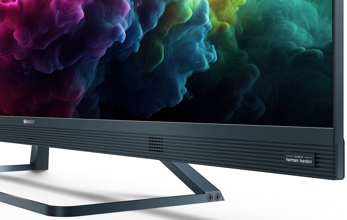 Ekran telewizora z żywą, kolorową sztuką abstrakcyjną i stojakiem.