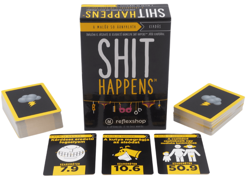 A 'Shit Happens' társasjáték kártyákkal, dobozzal és kártyahalommal.