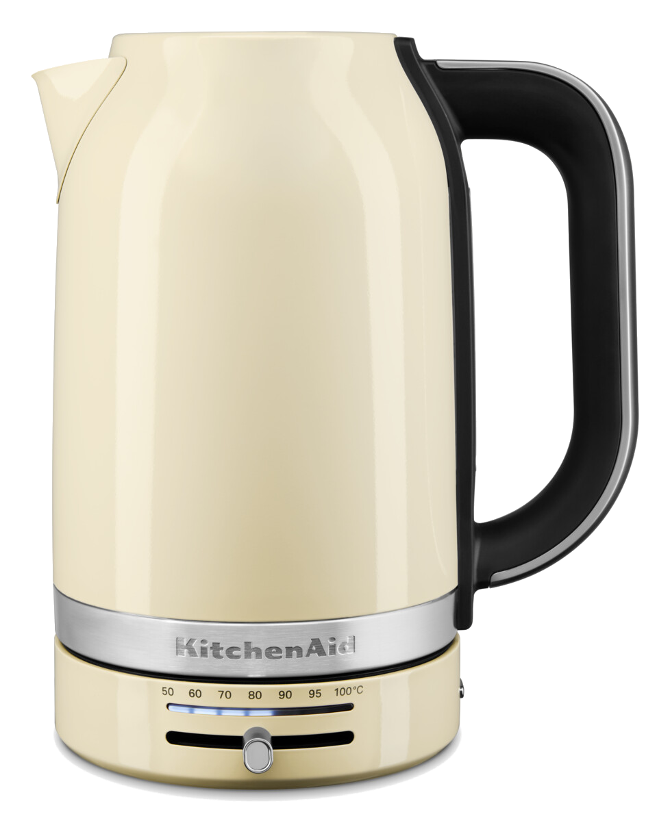 Cremefarbener Wasserkocher mit schwarzem Griff, KitchenAid-Logo und Temperaturregler.