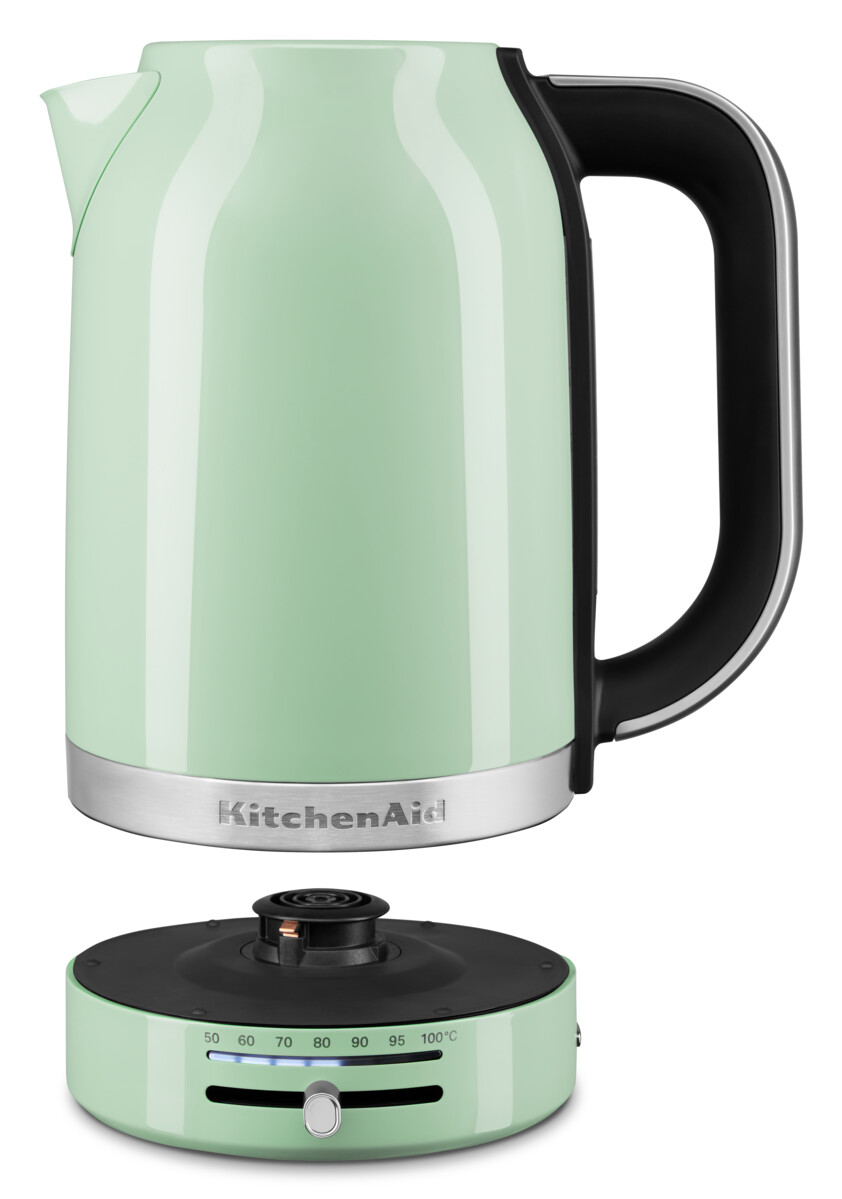 Ein mintgrüner Wasserkocher mit schwarzem Griff und Sockel, sowie einem Drehregler für Temperatur.