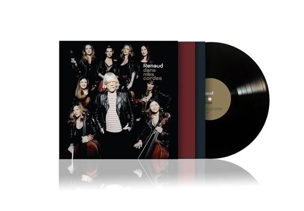 Albumhoes met een groep vrouwen en een man. Een vinylplaat ligt ernaast.