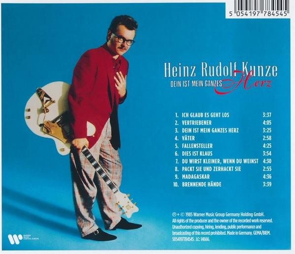 Albumcover mit einem Mann, der eine Gitarre hält, und einer Liste von Titeln.