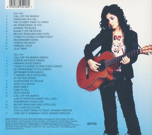 Albumcover mit einer Frau, die eine Gitarre hält. Songtitel sind auf der Seite aufgelistet.