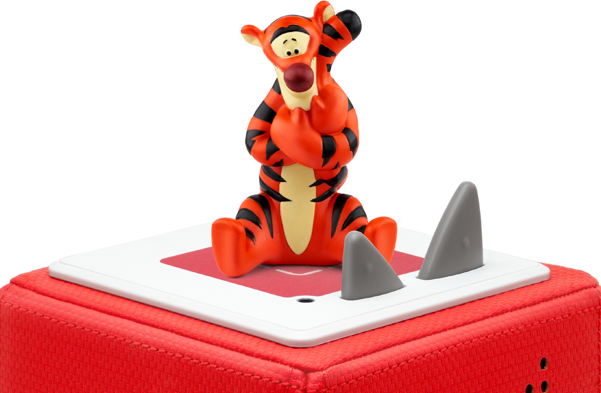 Tigger-Spielzeugfigur sitzt auf roter Basis mit Haifischflossen.