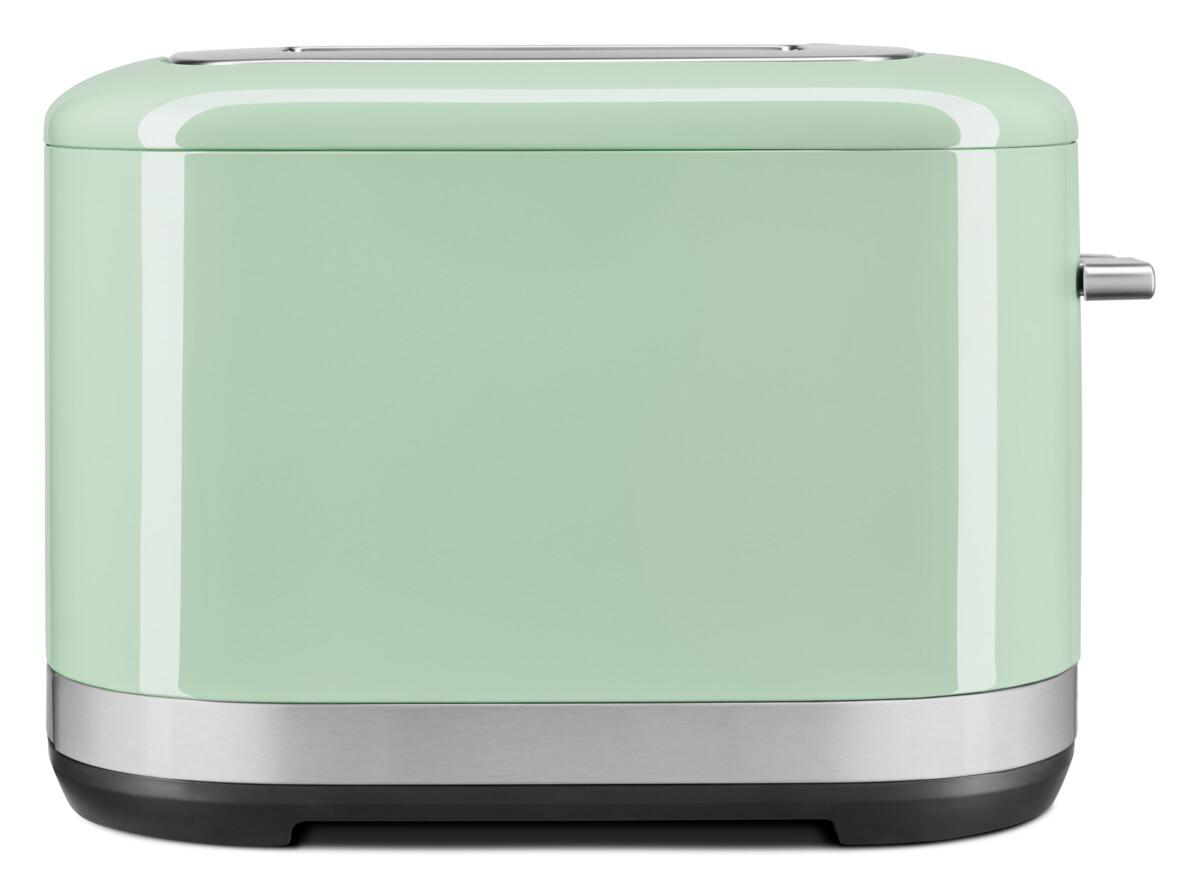 Minzgrüner Toaster mit Chromleiste. Der Toaster hat ein schlankes, modernes Design.