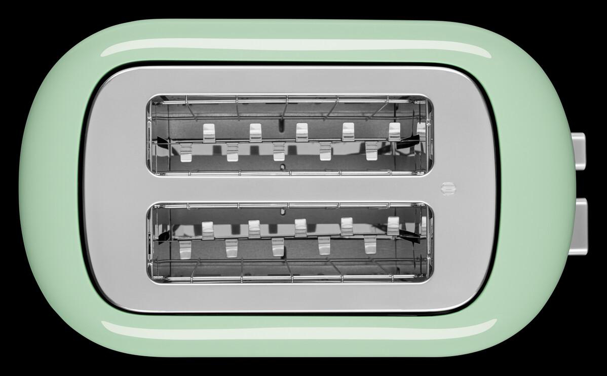 Grüner und silberner Toaster von oben. Zwei Schlitze. Schwarzer Hintergrund.
