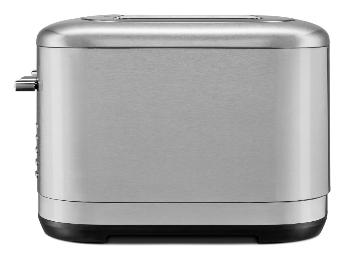 Silberner Toaster, Seitenansicht. Edelstahl mit schwarzem Sockel, Bedienelemente seitlich.