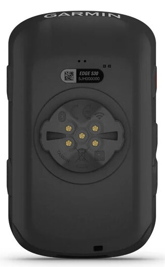 Tył czarnego komputera rowerowego Garmin Edge 530. Ma okrągły uchwyt ze złotymi pinami i etykietę produktu.