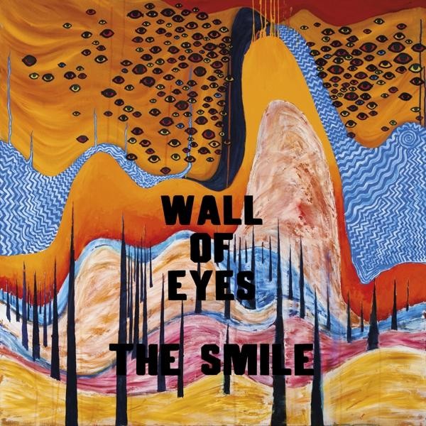 Albumcover für 'Wall of Eyes' von The Smile. Orange und blaue abstrakte Kunst. Schwarzer Text. Weißer Hintergrund.