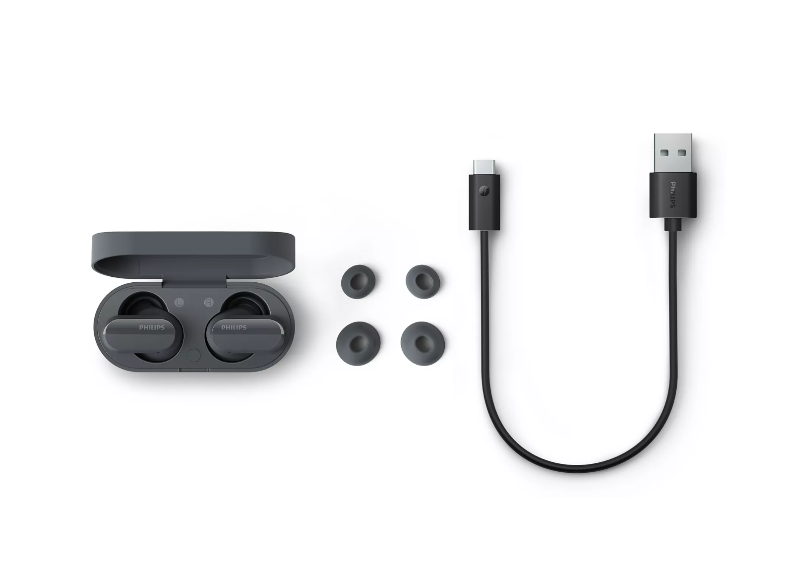 Kulaklıklar, şarj kutusu, ek kulak uçları ve beyaz bir arka plan üzerinde bir USB-C kablosu.
