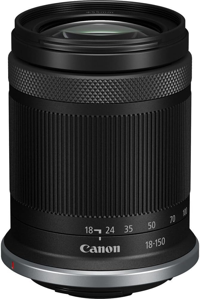 Lente Canon 18-150mm negro. Anillo plateado en la parte inferior. Ranuras verticales.