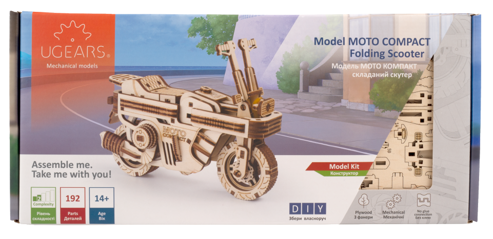 Fa modell motorkerékpár készlet egy dobozban, a kész modellt mutatva elöl.