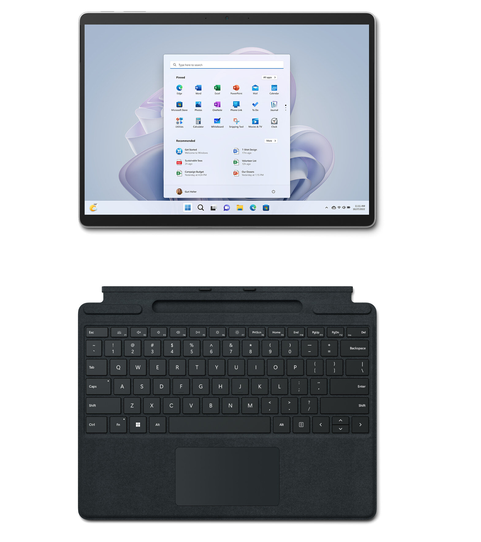Tablet z klawiaturą. Ekran wyświetla system Windows z wieloma ikonami aplikacji.