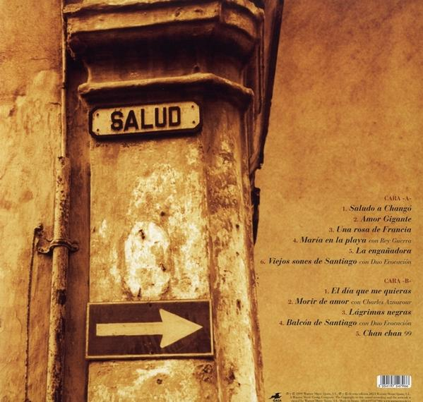 CD-Cover mit Text, einer Straßenszene und einem Schild mit der Aufschrift 'SALUD'.