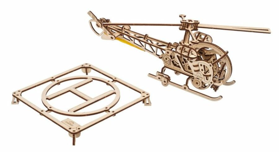 Fa helikopter modell és helikopter leszálló platform szett, szöveggel és design részletekkel.