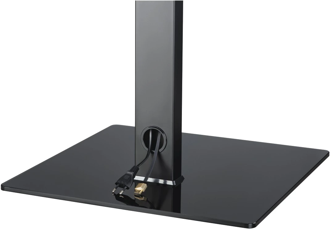 Una base per supporto TV nera con finitura lucida e gestione dei cavi, isolata.