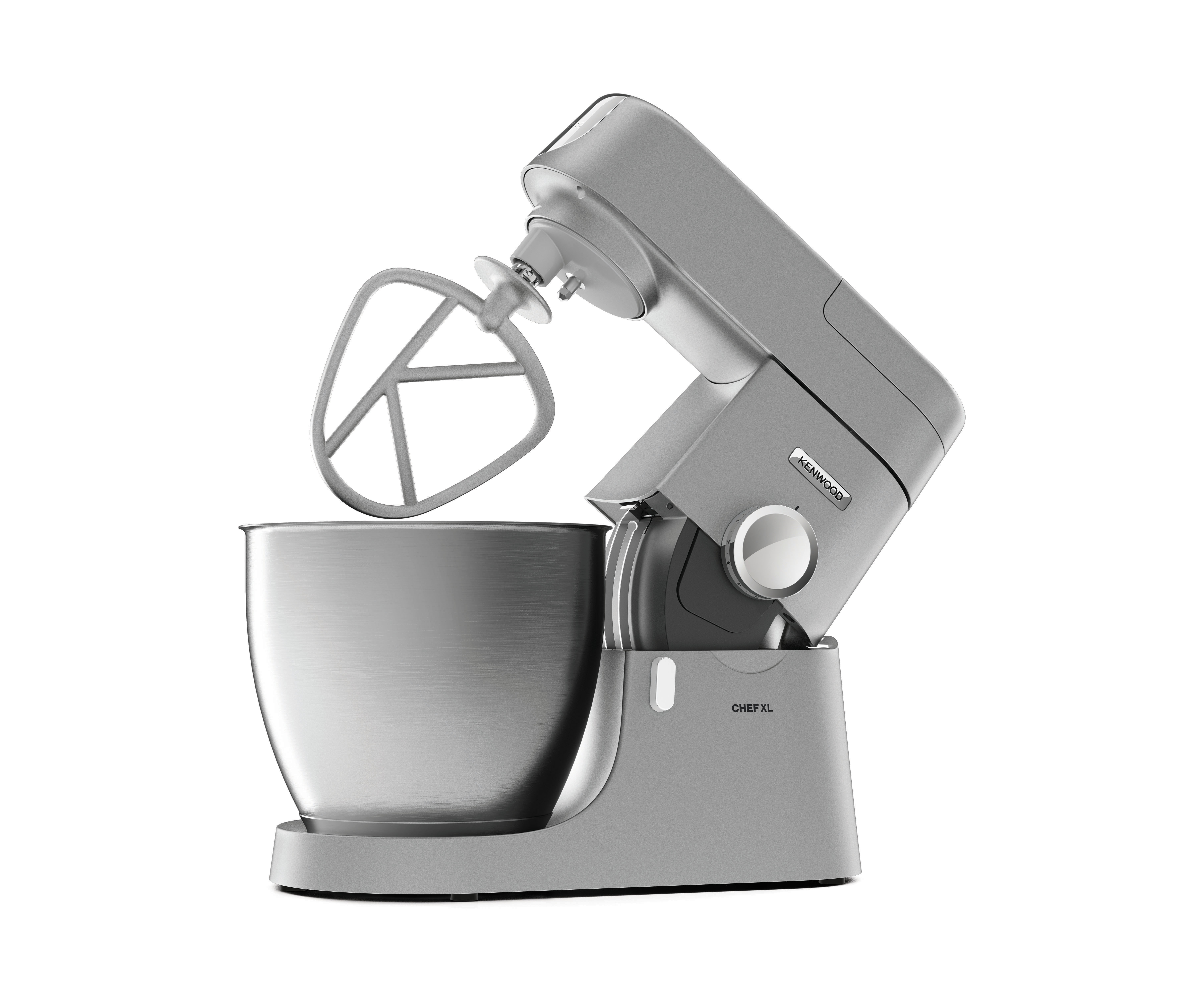 A grey stand mixer with the bowl and mixing attachments on a white background.