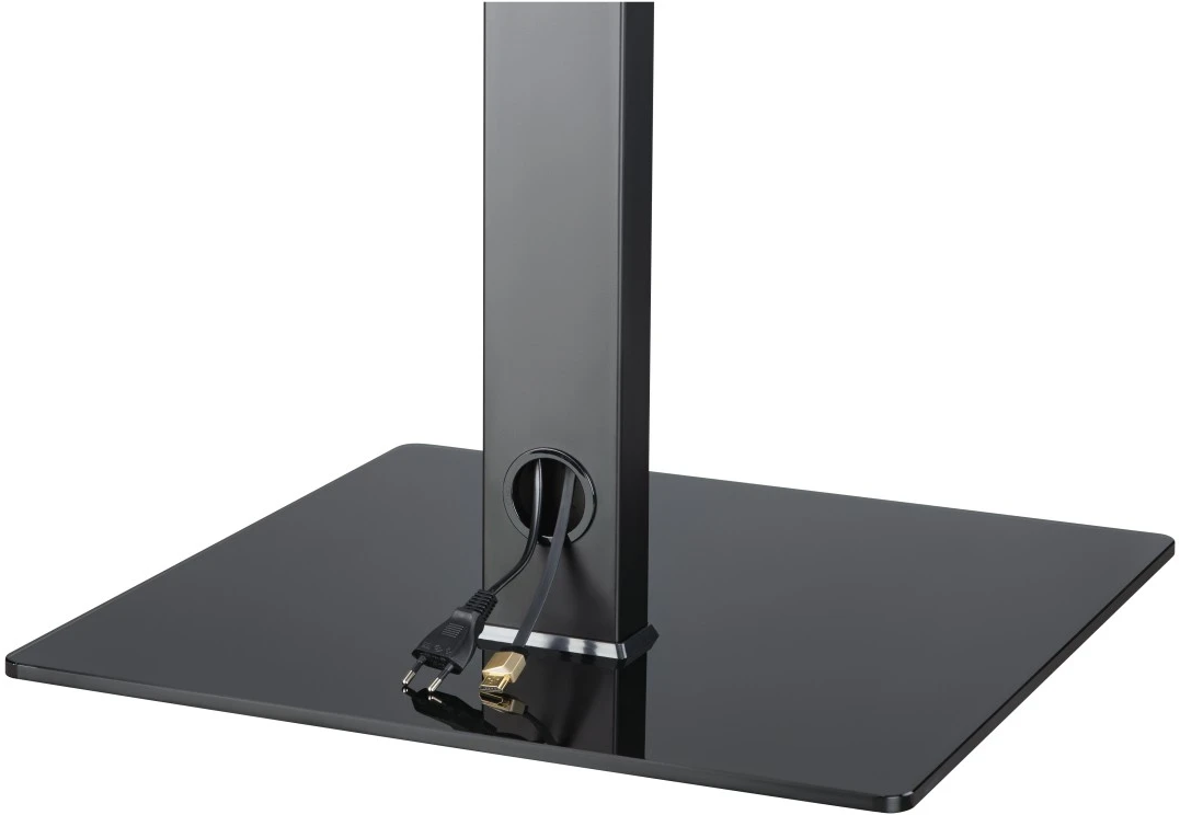 Schwarzer TV-Ständer mit rechteckiger Basis und Mittelsäule. Netzkabel sichtbar.