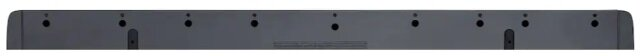 Szary soundbar z kilkoma otworami na górze.