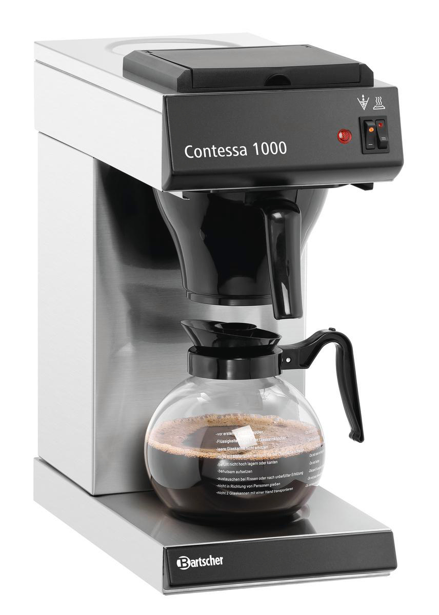 Eine Contessa 1000 Kaffeemaschine mit einer Glaskaraffe voller Kaffee. Sie hat einen schwarzen Griff und ein silbernes Gehäuse.