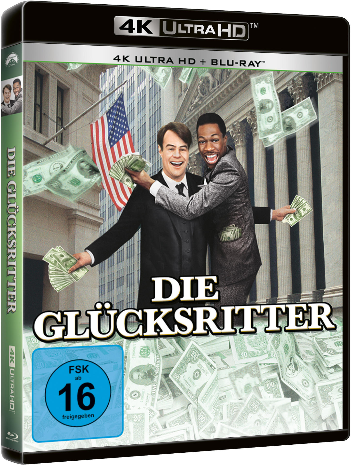 Filmcover von 'Die Glücksritter'. Zwei Männer, umgeben von Geld, stehen vor einem Gebäude, amerikanische Flagge.