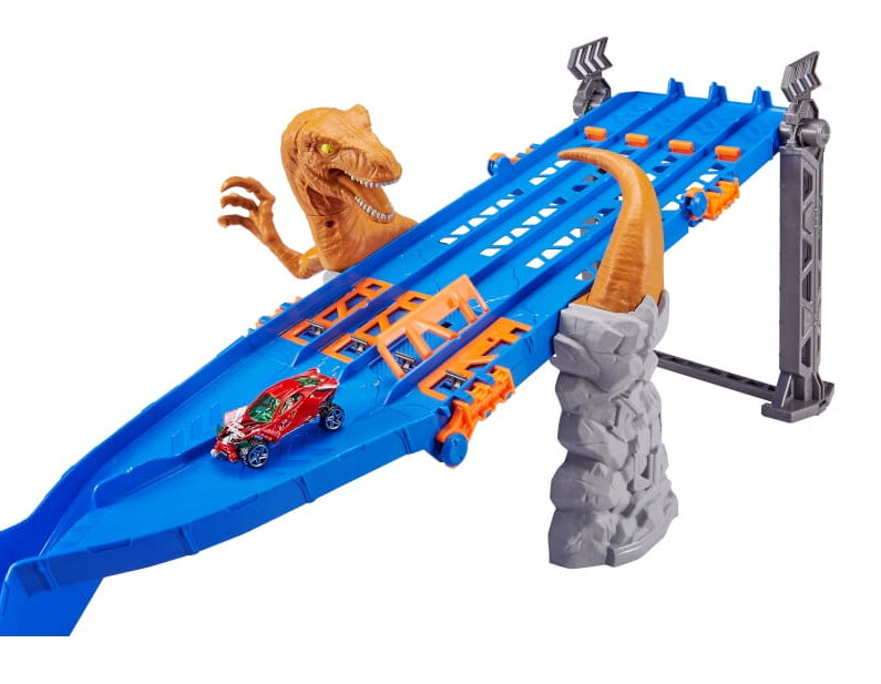 Zabawkowa trasa wyścigowa z dinozaurem i dwoma samochodami. Niebieski tor z pomarańczowymi akcentami.