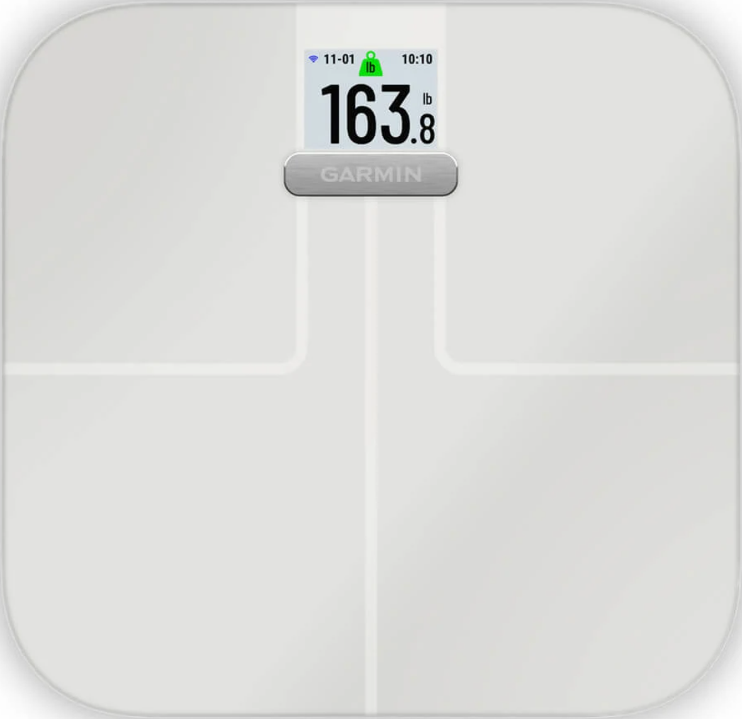 Bilancia Garmin bianca con display digitale che mostra il peso di 163,8 libbre.