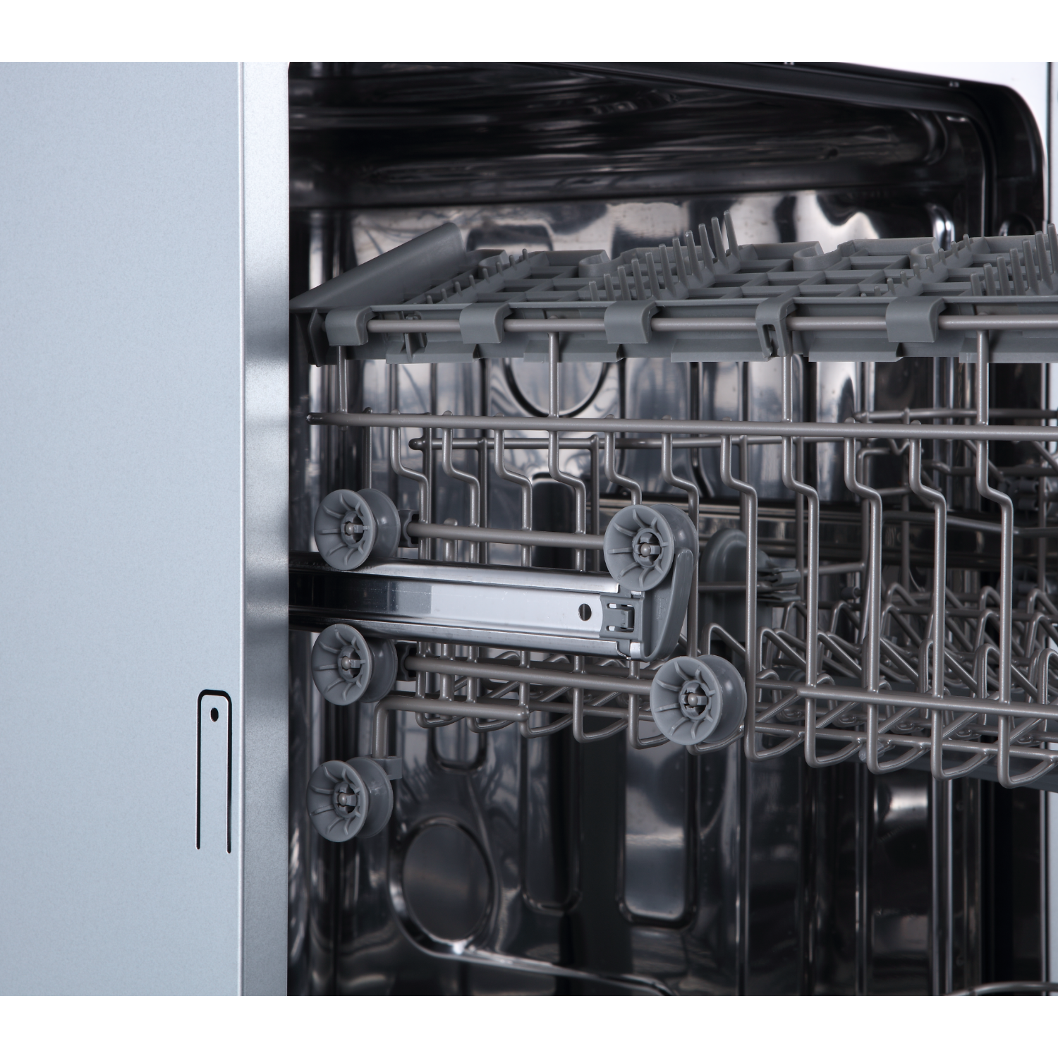 Interior of a dishwasher with racks and rollers, showing the inside.