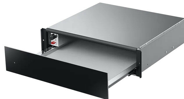 Urządzenie w stylu szuflady, otwarte, ze srebrnym wnętrzem.