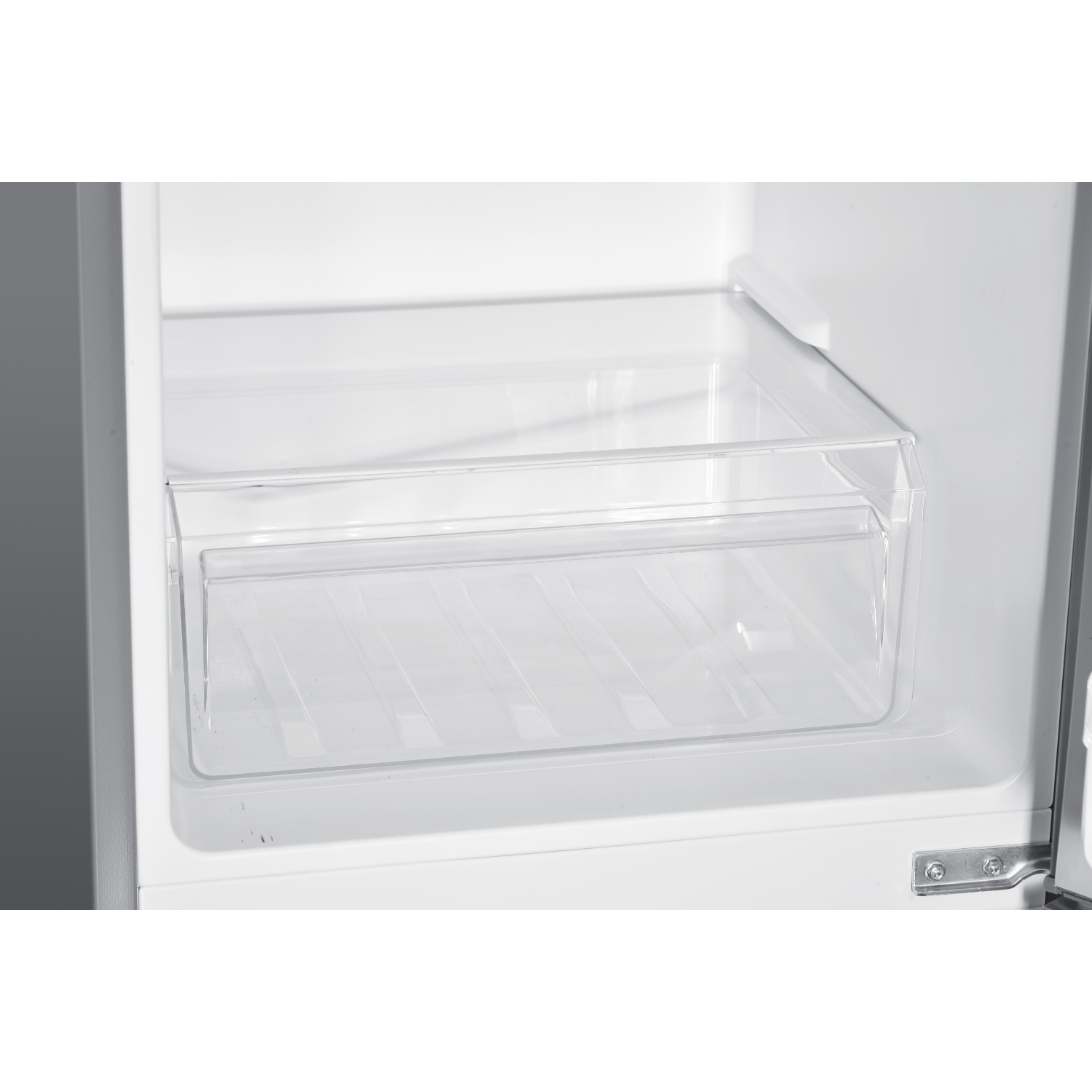 An open refrigerator with a clear plastic drawer. The drawer is empty.