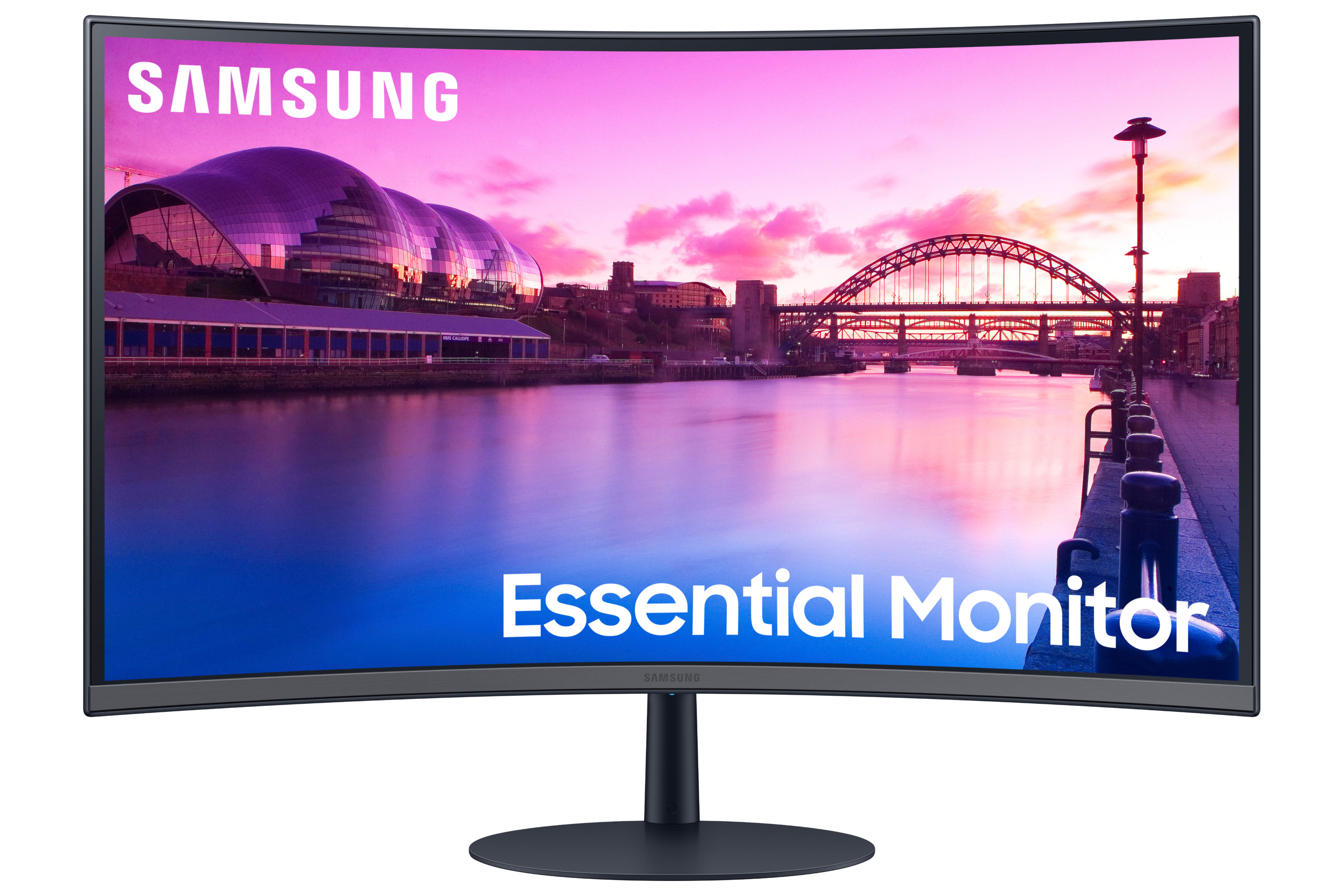 Gebogener Samsung Monitor, der eine Stadt in der Dämmerung mit Brücke und Wasser zeigt. Text 'Essential Monitor'.