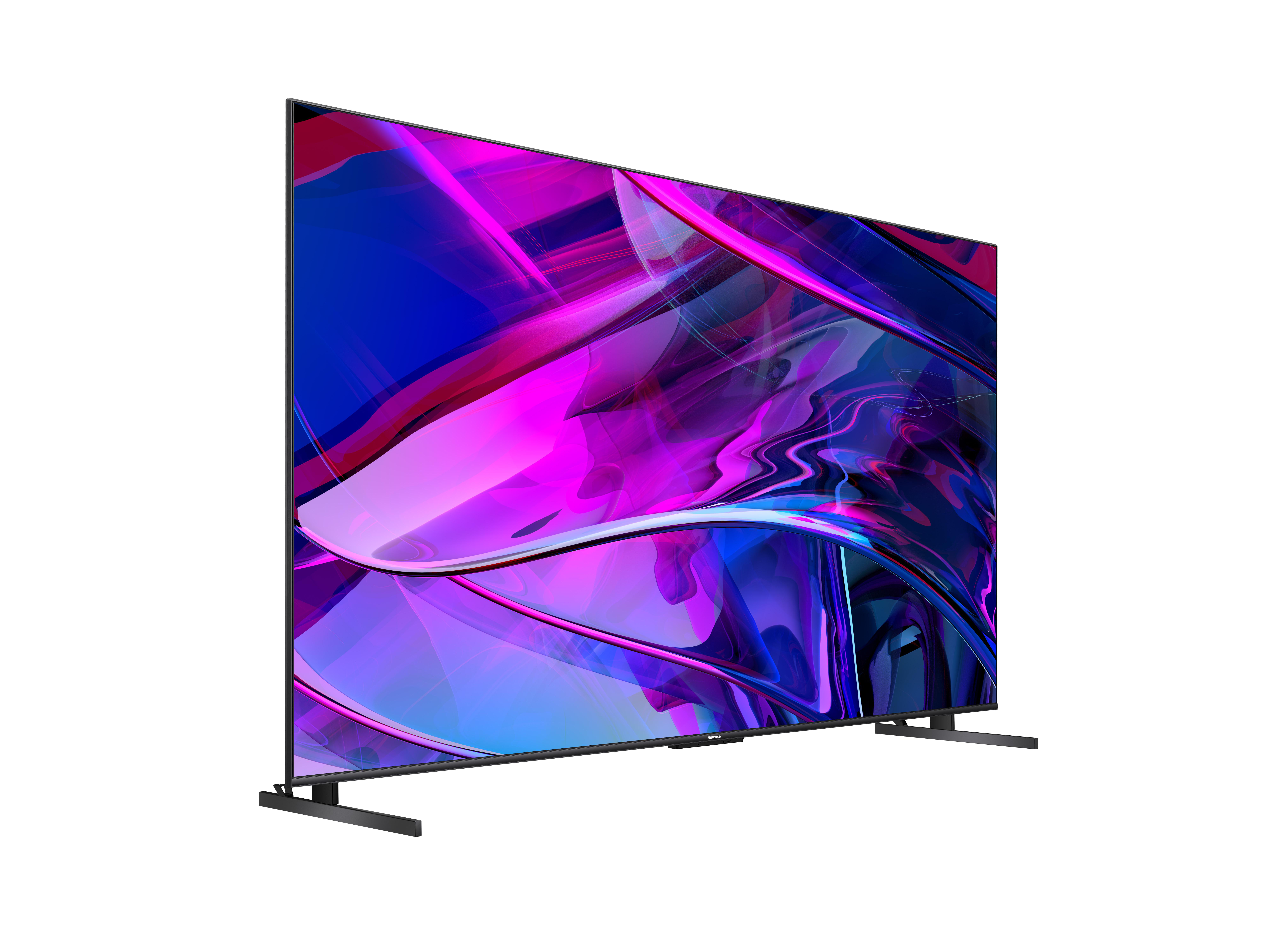Ein großer, schwarzer Fernseher mit farbenfroher Anzeige und Ständer, vor weißem Hintergrund.