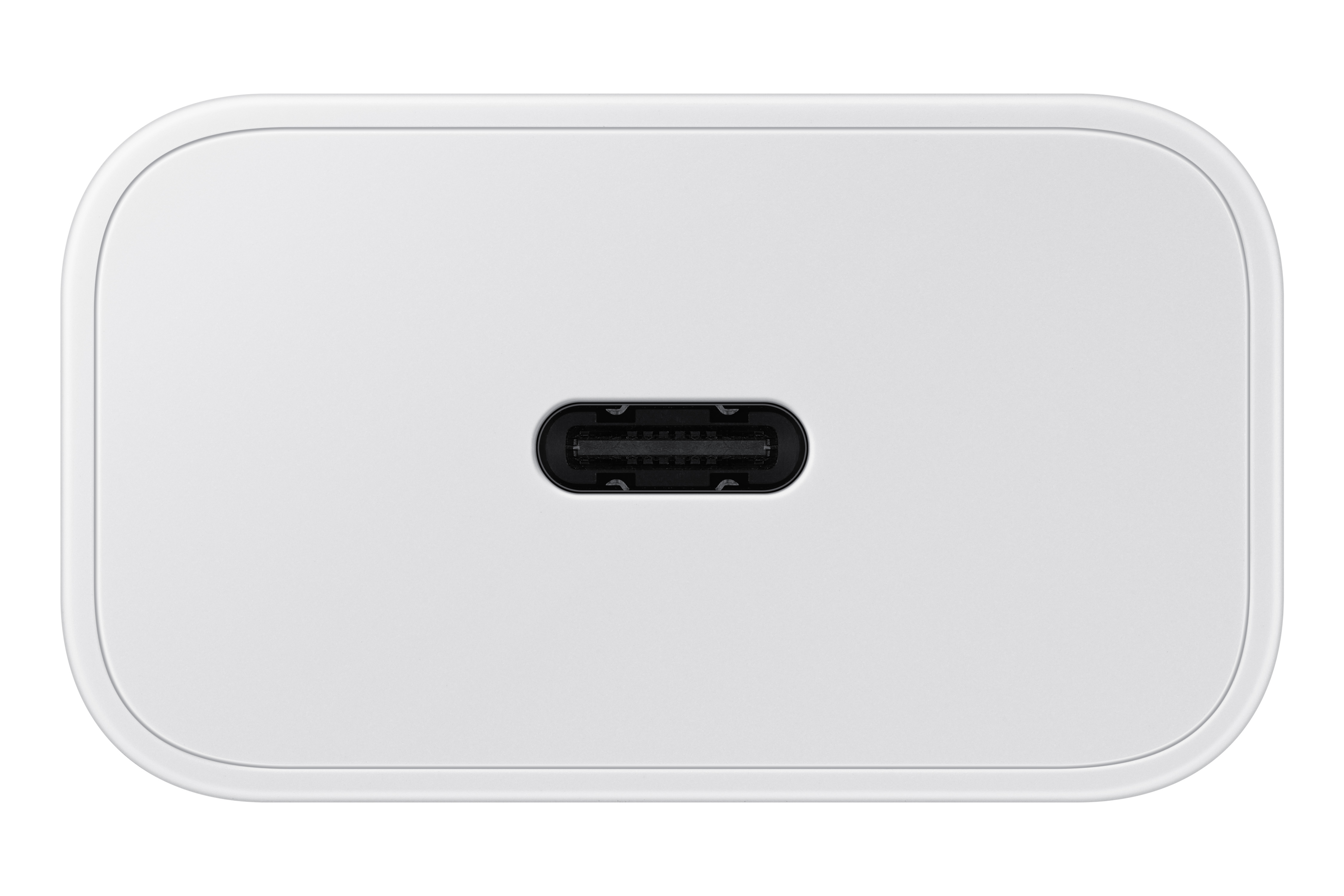 Beyaz USB-C şarj cihazı, yukarıdan görünüm. Yuvarlak köşeli oval şekil. Ortada USB-C portu.