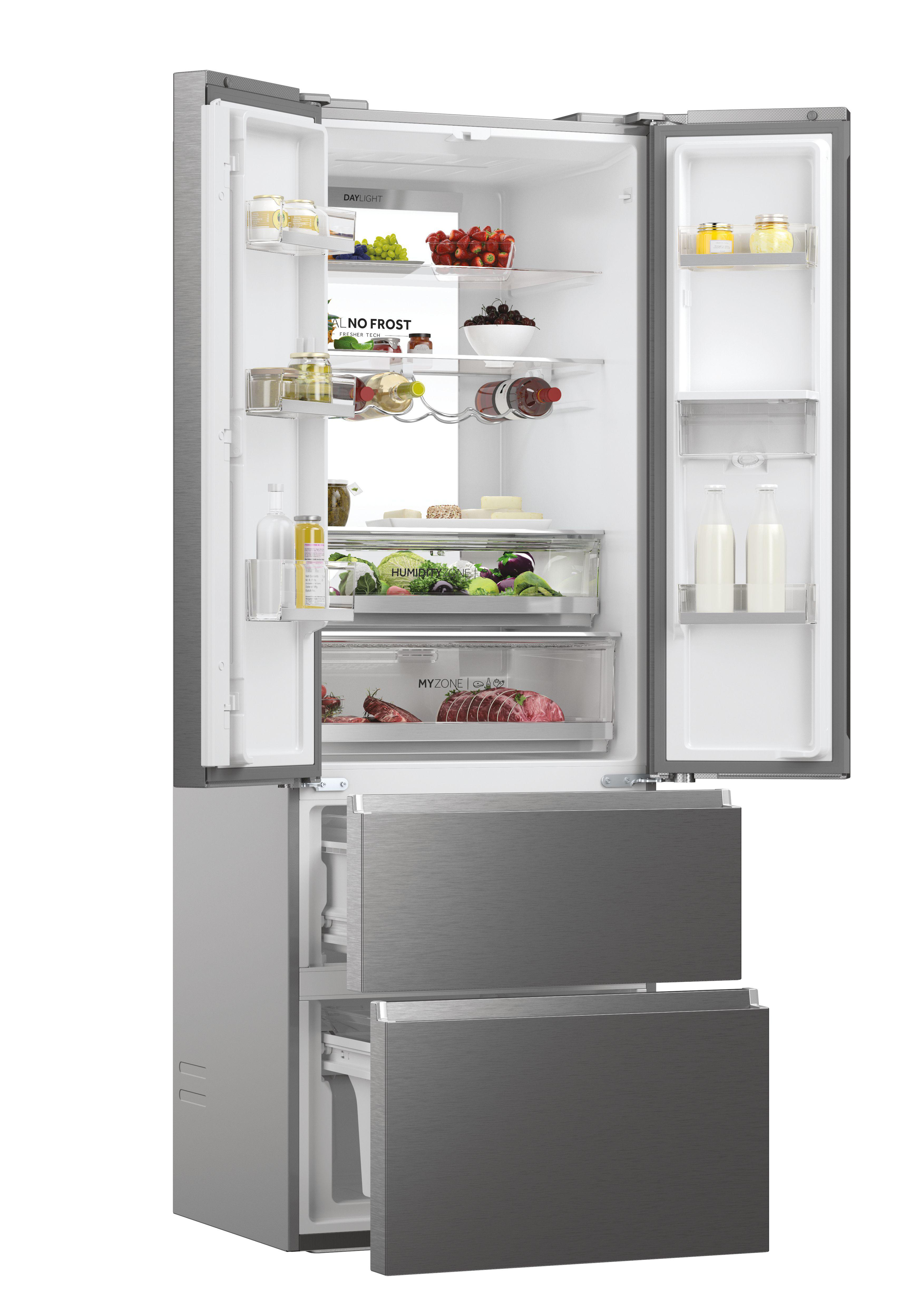 Offener Edelstahl-Haier-Kühlschrank mit Regalen voller Speisen und Getränke. Mit Schubladen und No Frost.